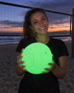 Volley Glow volleyball glowing green at night